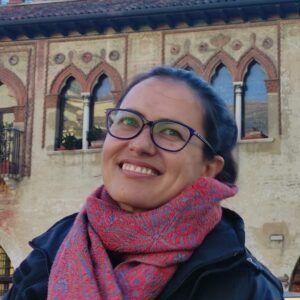 Jessica Wright, owner of Earth and Spirit Landscape Design, standing in a garden